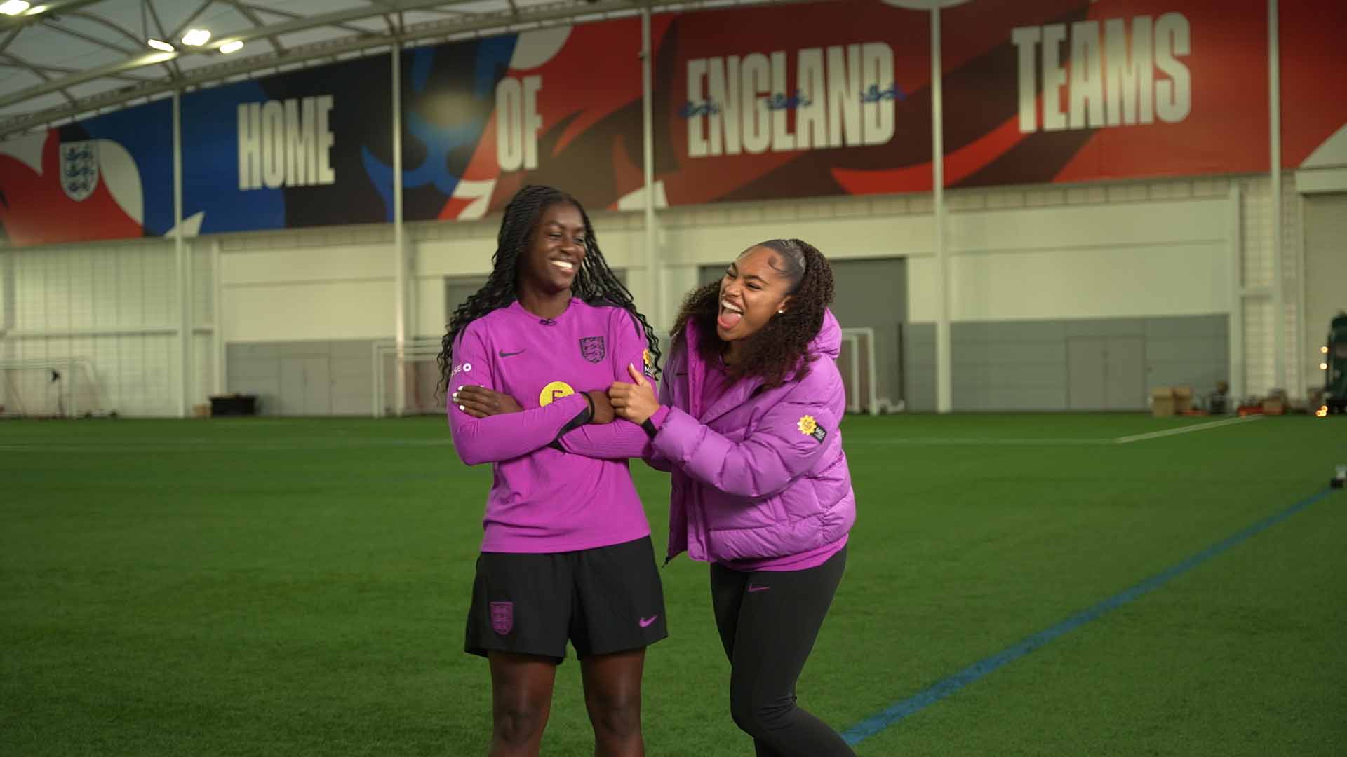 Two England players sharing a moment during training