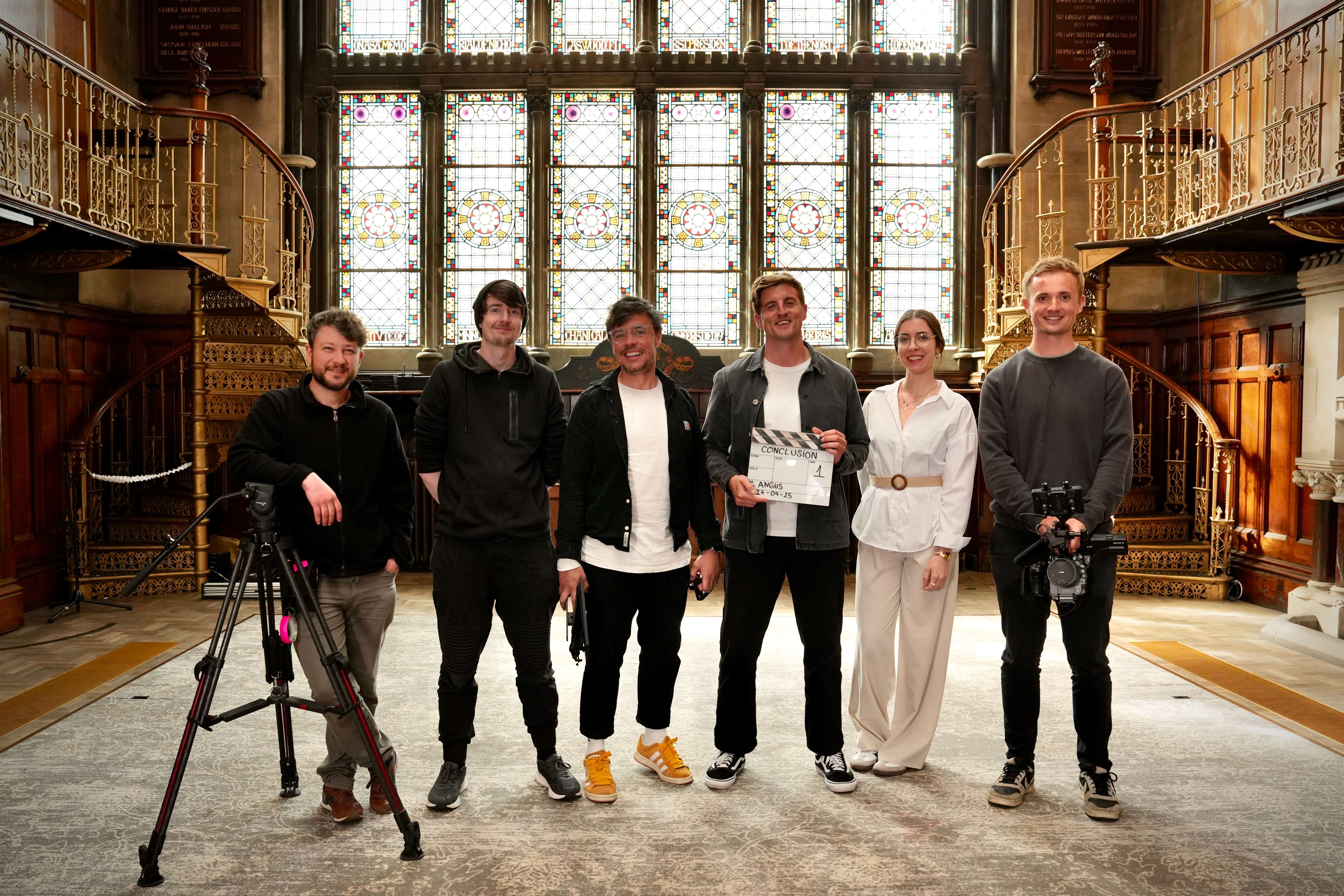 Video production team filming at historic location - North East England video production services
